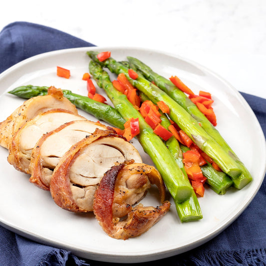 Bacon Wrapped Chicken Thighs With Roasted Asparagus & Red Peppers